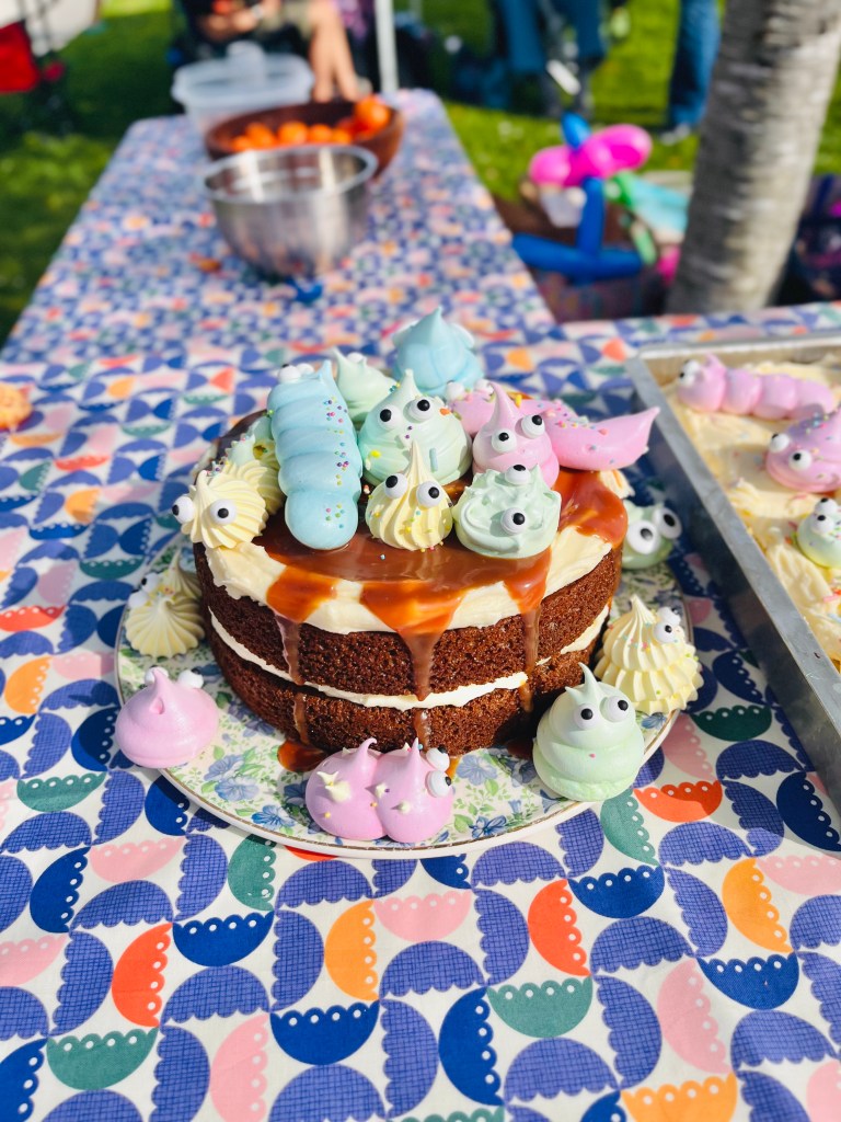 meringue critters on cake
